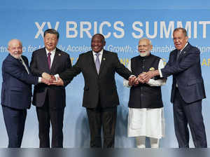 From left, Brazil's President Luiz Inacio Lula da Silva, China's President Xi Ji...