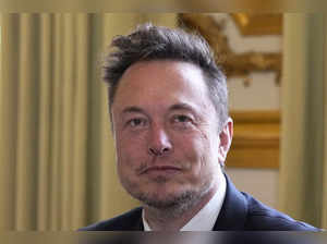 Twitter, now X. Corp, and Tesla CEO Elon Musk poses prior to his talks with Fren...