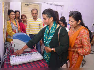 Jabalpur, July 13 (ANI): Election commission officials demonstrate the functioni...