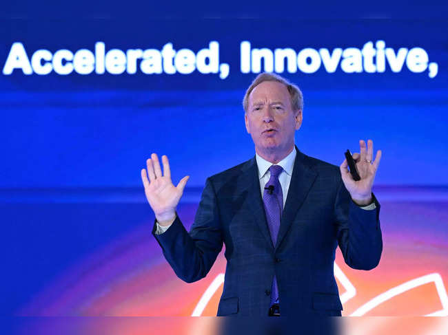 Brad Smith, President and Vice Chairman of Microsoft, addresses the gathering on the first day of the three-day B20 Summit in New Delhi on August 25, 2023. (Photo by Sajjad HUSSAIN / AFP)