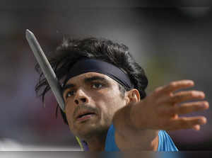 Neeraj Chopra, of India, makes an attempt in the Men's javelin throw qualificati...