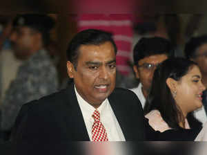 FILE PHOTO: Mukesh Ambani, Chairman and Managing Director of Reliance Industries, attends the company's annual general meeting in Mumbai