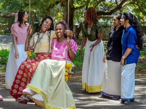S African students enjoy high swings
