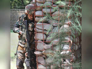 Poonch: An Indian army soldier while patrolling along the Line of Control (LOC) ...