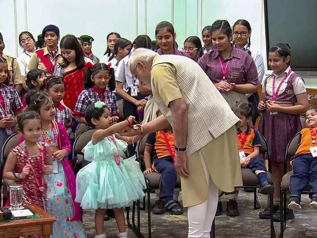Modi's rakhi with children