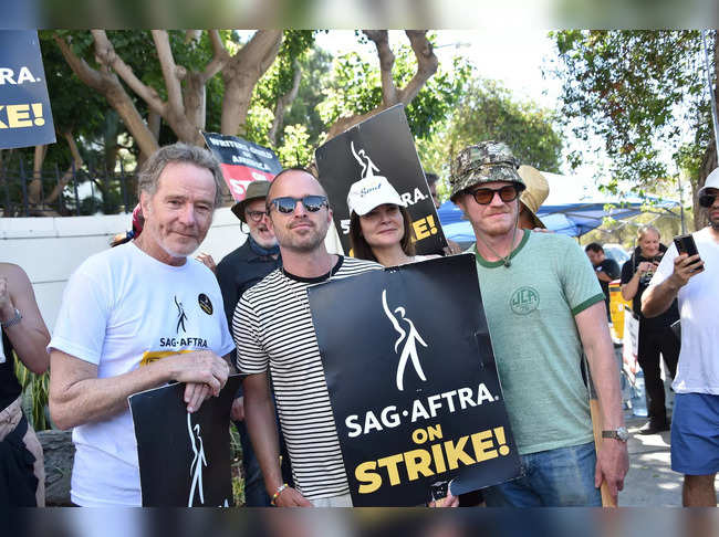 "Breaking Bad" actors (L-R) Bryan Cranston, Aaron Paul, Betsy Brandt and Jesse Plemons join the Screen Actors Guild (SAG-AFTRA), picket line in front of Sony Studios in Culver City, California, on August 29, 2023.
