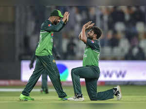 Pakistan's Haris Rauf (R) celebrates with teammates after taking the wicket of Nepal's Sompal Kami (not pictured) during the Asia Cup 2023 cricket match between Pakistan and Nepal at the Multan Cricket Stadium in Multan on August 30, 2023.