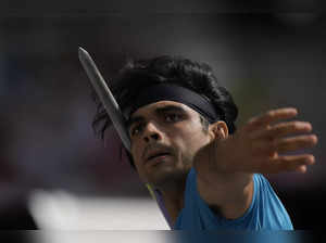 Neeraj Chopra, of India, makes an attempt in the Men's javelin throw qualificati...