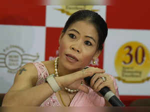 Kolkata: Boxer Mary Kom interacts with the media after receiving 30th P.C. Chand...
