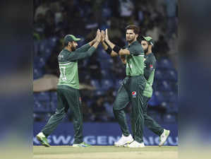 Shaheen Shah Afridi of Pakistan celebrates the wicket of India's Hardik Pandya d...