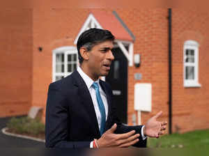 Britain's Prime Minister Rishi Sunak visits the Taylor Wimpey Heather Gardens housing development in Norwich on August 29, 2023.