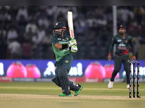Pakistan's Mohammad Rizwan, center, bats during the Asia Cup cricket match betwe...