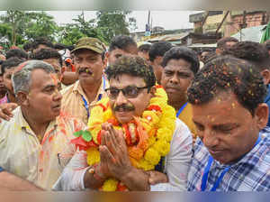 BJP candidate Tafajjal Hossain celebrates his victory in the Boxanag...