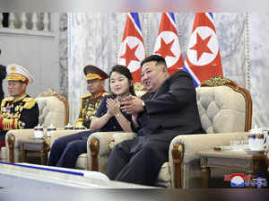 Kim Jong Un hosts Chinese and Russian guests at a parade celebrating North Korea's 75th anniversary