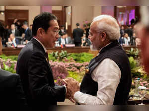 India’s Prime Minister Narendra Modi (R) and Japan’s Prime Minister Fumio Kishida speak before the 18th East Asia Summit during the 43rd ASEAN Summit in Jakarta on September 7, 2023.