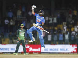 India's Virat Kohli celebrates his hundred runs during the Asia Cup cricket matc...
