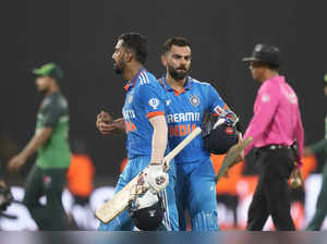 India's Virat Kohli and KL Rahul cheer themselves during the Asia Cup cricket ma...