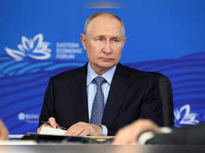 Russian President Vladimir Putin chairs a meeting in Vladivostok