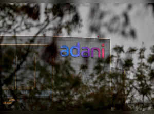 FILE PHOTO: The logo of the Adani Group is seen on the facade of its Corporate House on the outskirts of Ahmedabad
