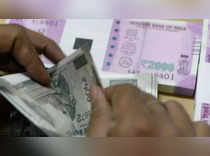 Rupee upside seen capped on importer hedging, oil prices