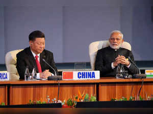 FILE PHOTO: Indian Prime Minister Narendra Modi and China's President Xi Jinping attend a BRICS summit meeting in Johannesburg