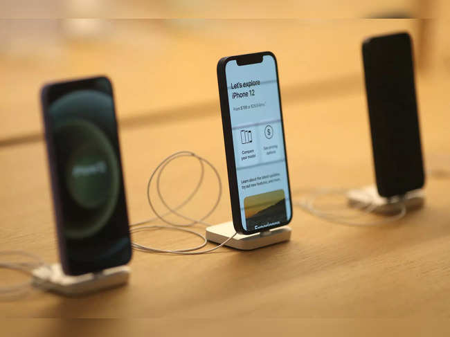 FILE PHOTO: IPhone 12 phones are seen at the new Apple Store on Broadway in downtown Los Angeles