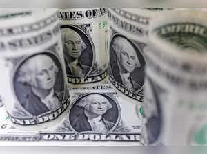 Illustration shows U.S. Dollar banknotes