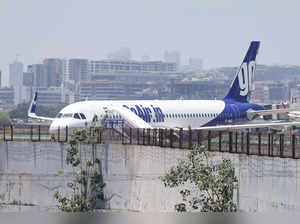 FILE PHOTO: A Go First airline, formerly known as GoAir, passenger aircraft is parked at the Chhatrapati Shivaji International Airport in Mumbai