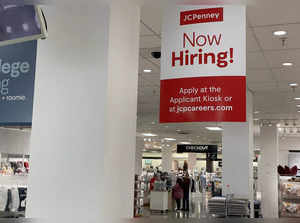A help wanted sign is posted inside a JCPenney store at The Shops at Tanforan on September 01, 2023 in San Bruno, California.