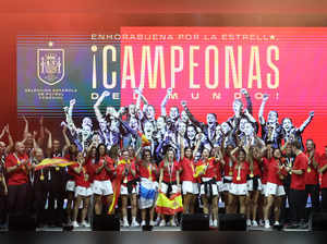 Spain women’s national football team's players celebrate on stage their 2023 World Cup victory in Madrid on August 21, 2023.