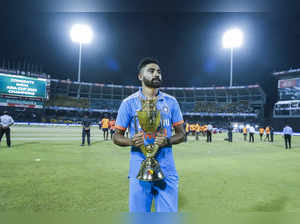 India's Mohammed Siraj poses with the trophy after India won the Asia Cup final ...