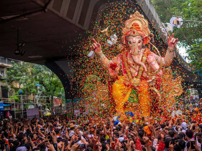 Ganesh Chaturthi is celebrated by making idols of Lord Ganesha, decorating them, and immersing them in water.