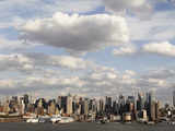 Clouds pass over the skyline of midtown Manhattan in New York