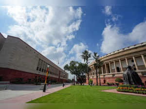 New Delhi: Clouds hover over the old and new Parliament buildings on the first d...