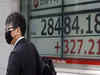 Asian stocks slide amid China woes, Japan catches up on chip sell-off