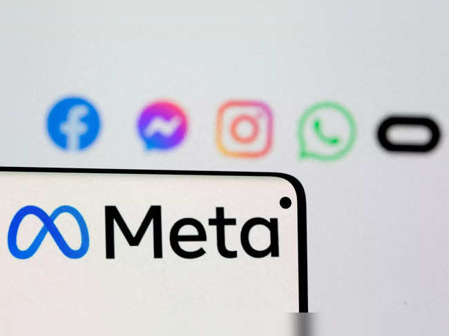 FILE PHOTO: Facebook's new rebrand logo Meta is seen on smartphone in this illustration picture