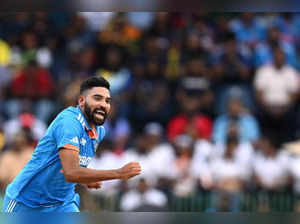 India's Mohammed Siraj celebrates after taking the wicket of Sri Lanka's Dhananjaya de Silva during the Asia Cup 2023 final one-day international (ODI) cricket match between Sri Lanka and India at the R. Premadasa Stadium in Colombo on September 17, 2023.