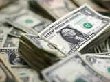 Dollar retreats ahead of Fed decision; cooling inflation weighs on sterling
