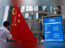 China stocks hit 10-month low on hawkish US Fed stance