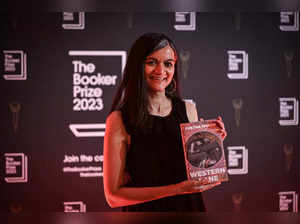 British Indian author Chetna Maroo poses with her book "Western Lane" during the photo call for the authors shortlisted for the Booker Prize 2023 for Fiction at the National Portrait Gallery,  in London, on September 21, 2023.