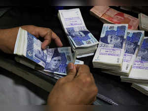 Pakistan rupee closes at record low of 300.2 to the dollar