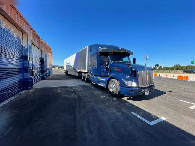 FILE PHOTO: A Peterbilt 579 truck equipped with Aurora's self-driving system is seen at the company's terminal in Palmer