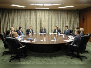 Bank of Japan (BoJ) governor Kazuo Ueda (C) attends a meeting with policy board members at the BoJ headquarters in central Tokyo on September 22, 2023, as the bank is expected to conclude the meeting later in the day.
