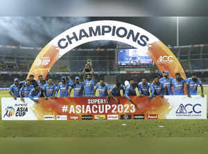 Indian players celebrate with the trophy after their win in the Asia Cup cricket...