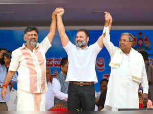 Bengaluru: Congress leader Rahul Gandhi with Karnataka CM-designate and Dy CM-designate Siddaramaiah and DK Shivakumar during their oath ceremony, at Kanteerava Stadium in Bengaluru, Saturday, May 20, 2023.  (Photo: IANS)