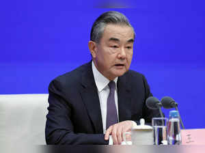 Chinese Foreign Minister Wang Yi attends a press conference in Beijing