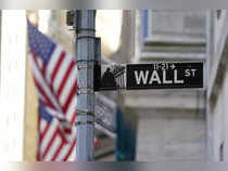 Wall St pounded as investors grapple with higher rates