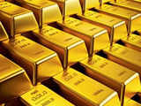 Gold lingers near 1-month low as US dollar keeps momentum