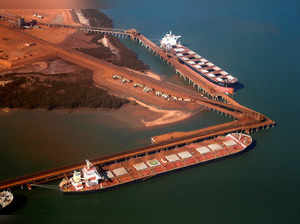 FILE PHOTO: FILE PHOTO: Ships waiting to be loaded with iron ore are seen at the Fortescue loading dock located at Port Hedland