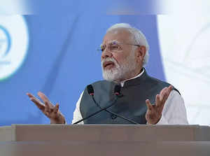 Ahmedabad, Sept 27 (ANI): Prime Minister Narendra Modi addresses during an event...